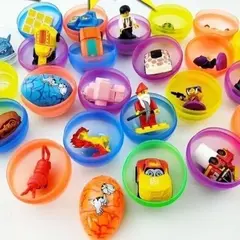 Игрушки в капсулах 65 мм