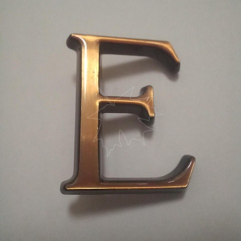 Бронзовая буква Е на памятник высотой 3см, Caggiati