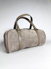 Женская замшевая сумка-бочонок бежевого цвета