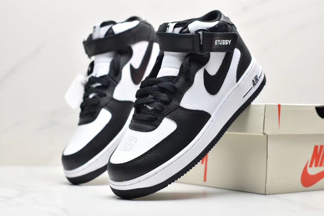 Nike air force 1 mid black and white hot sale