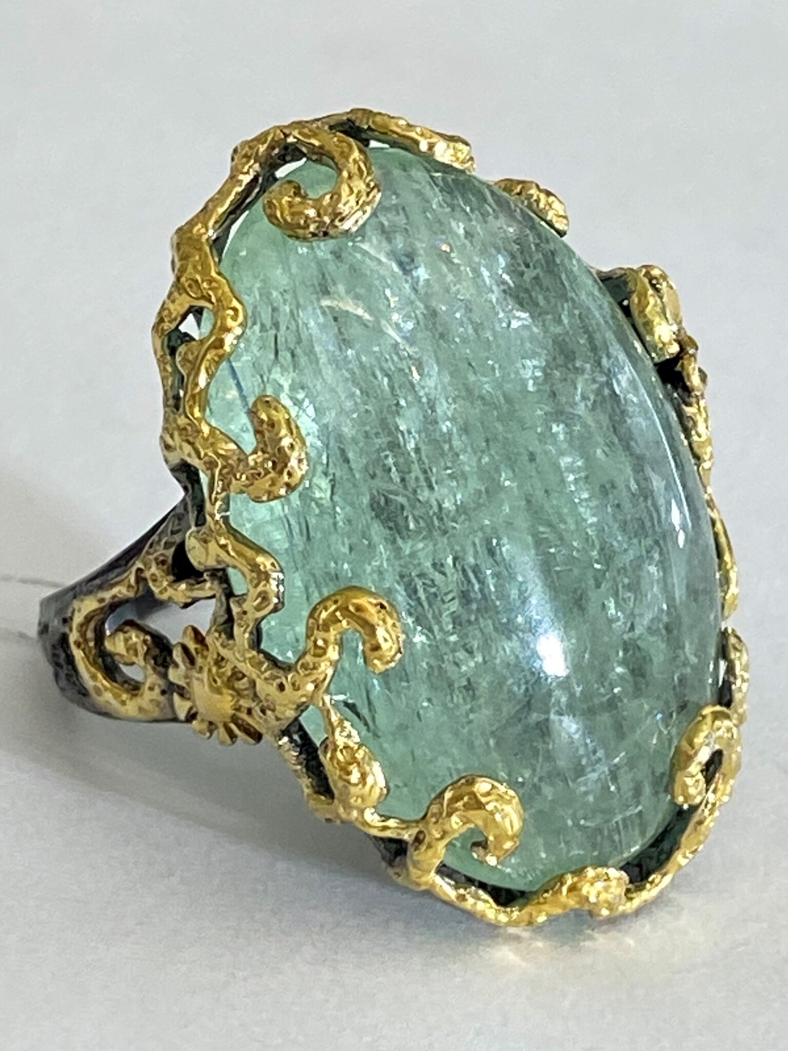 Аквамарин (серебряное кольцо с позолотой)
