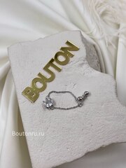 Кольцо серебристое на цепочке с белым стразом