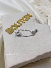Кольцо серебристое на цепочке с белым стразом