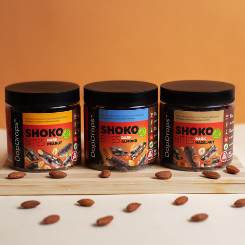 Темный шоколад с кусочками миндаля “Шоко Байтс Дарк Альмонд” (“Shoko Bites Dark Almond”) 120г