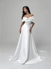 Свадебное платье с бантом и открытыми плечами