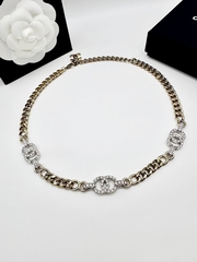 Колье чокер с логотипами CHANEL шампань