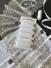 Вышивка на сетке молочная 21 см