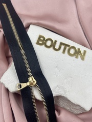 Молния металл Riri, золото на атласной тесьме, 4 мм, цвет черный 2110