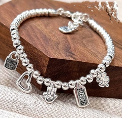 68127- Браслет UNOde 50 с подвесками