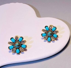 sergi-romashki-s-golubymi-rozovymi-vstavkami-cvet-bronza-gucci