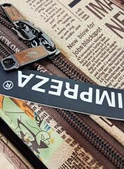 Чемодан ткань Impreza Газета 2 колеса 61х39х28(+3)см/72л/3.7 кг (М)4