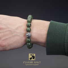 Браслет из нефрита с бусиной из серебра Спас Нерукотворный.