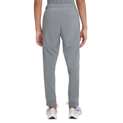 Детские теннисные брюки Nike Dri-Fit Woven Pant B - smoke grey