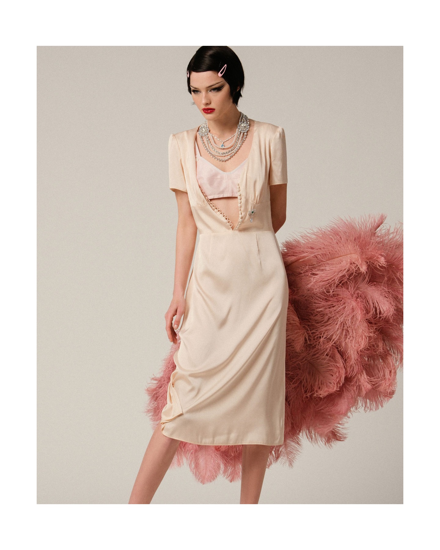 Веер из страусиных перьев