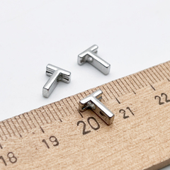 Подвеска-бусина Буква T, цвет серебро (родий), размер 8,5*6 мм, отверстие 1,5 мм, цена за 1 шт