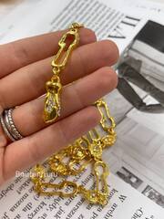 Пояс Скиап. золотистый с Птицей и звеньями в форме замочных скважин 85 см