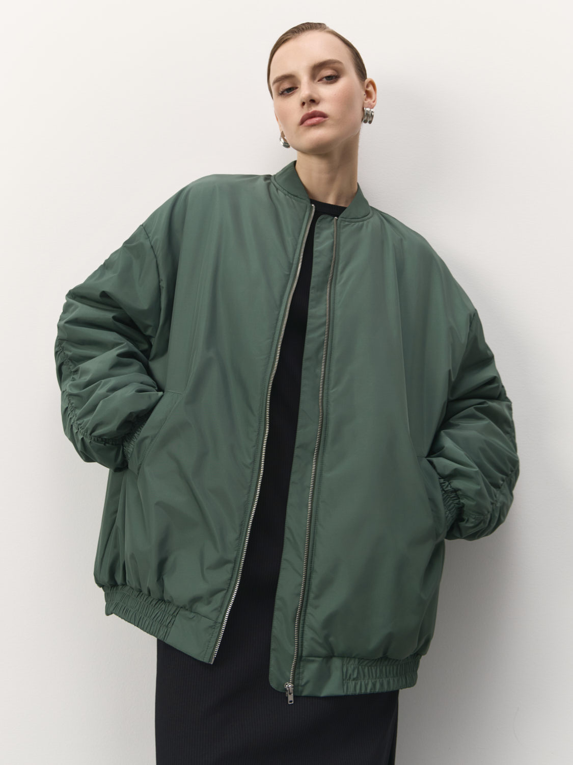 Quilted buttoned jacket Luga with a hood