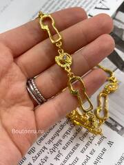 Пояс Скиап. золотистый с Птицей и звеньями в форме замочных скважин 85 см