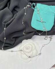 Длинное колье-нитка 33 камня из серебра 925пробы с завальцоваными куб.цирконами в стиле Tiffany