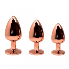 Анальная пробка золотистого цвета с розовым кристаллом Tralalo от WOOOMY  (S: 7*2,8 см.)