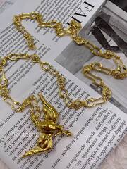 Пояс Скиап. золотистый с Птицей и звеньями в форме замочных скважин 85 см