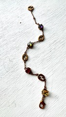 Браслет-цепочка с цветными камнями и лого style by GUCCI, цвет бронза