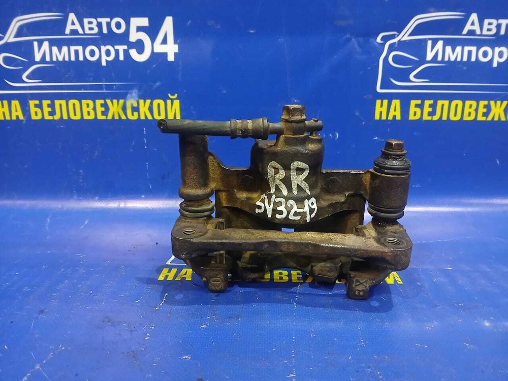 Суппорт тормозной задний правый TOYOTA VISTA 1990