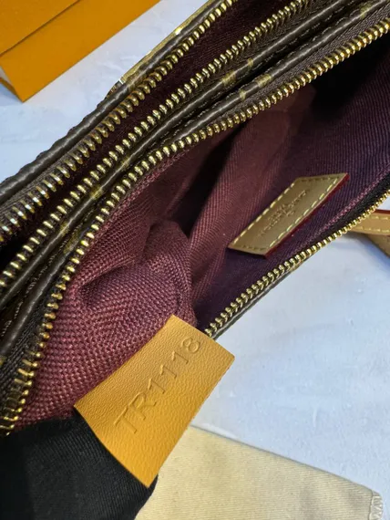 Сумка-клатч Louis Vuitton Liv, коричневый