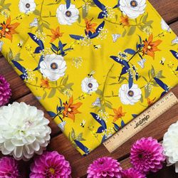 Ткань флис яркие цветы с синими листьями