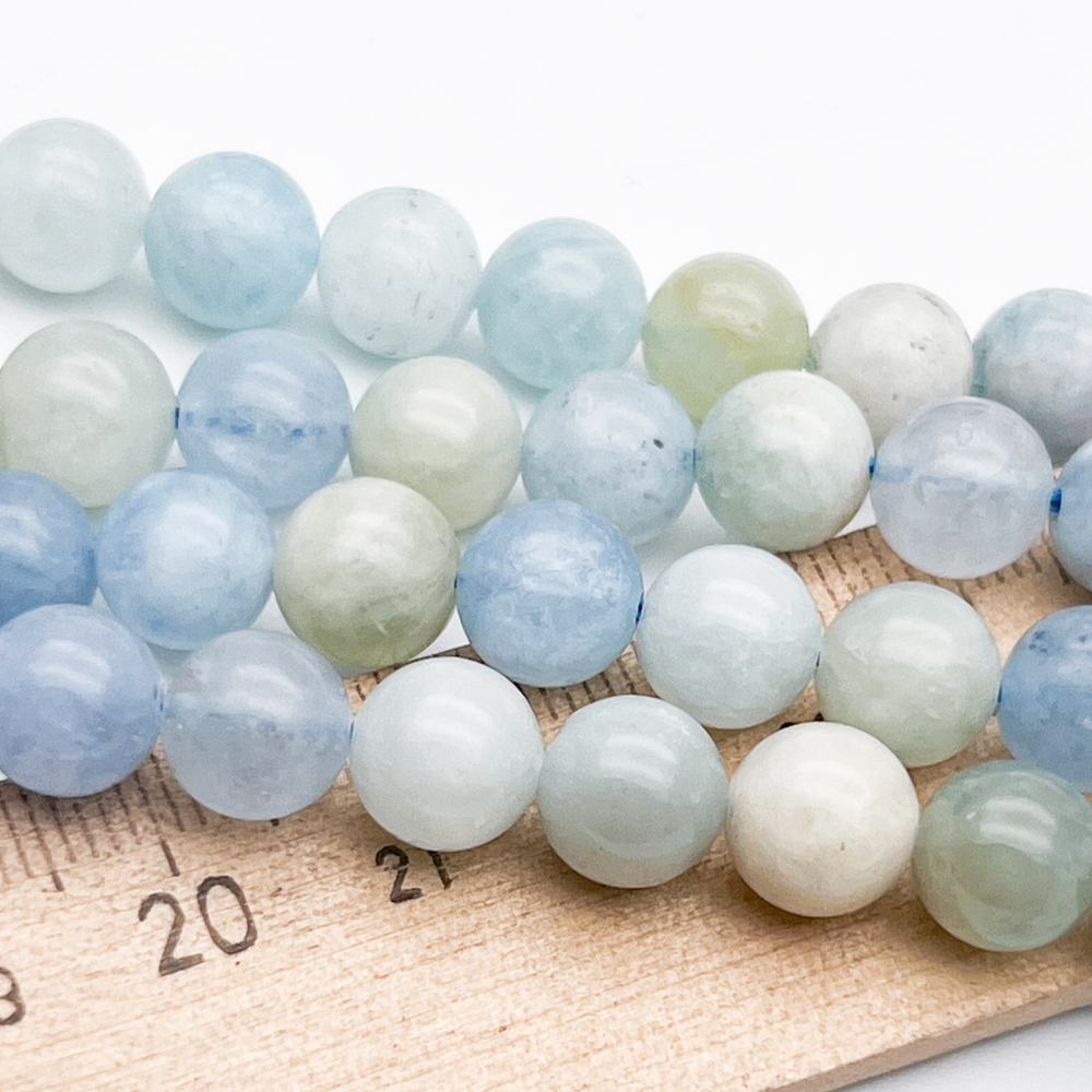Аквамарин+берилл бусины, диаметр 8,2-8,4 мм, цена за 23 шт (1/2 нити)