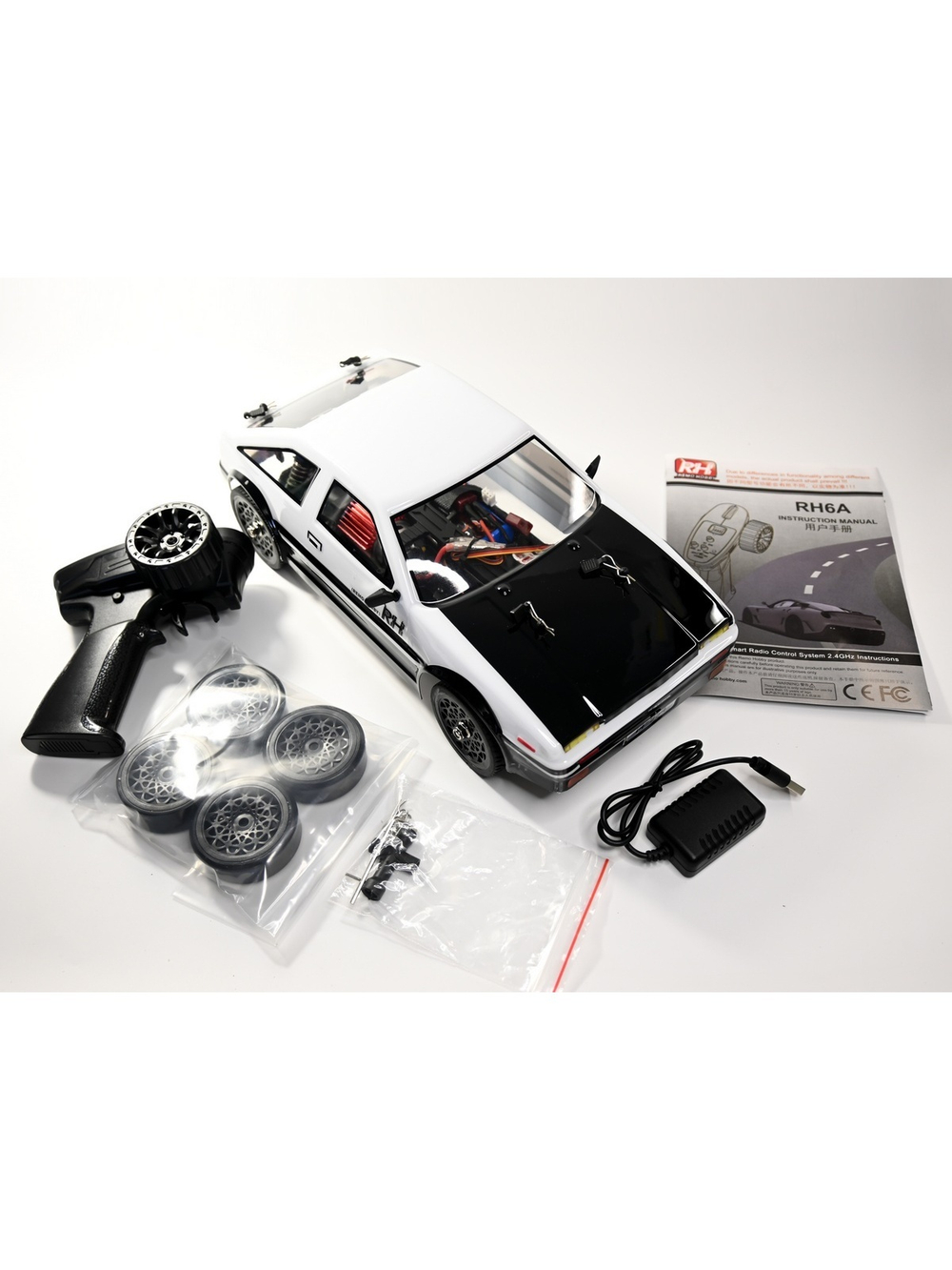 Радиоуправляемая машина для дрифта Remo Hobby RACING & DRIFT (бело-черная) 4WD 2.4G 1/14 RTR