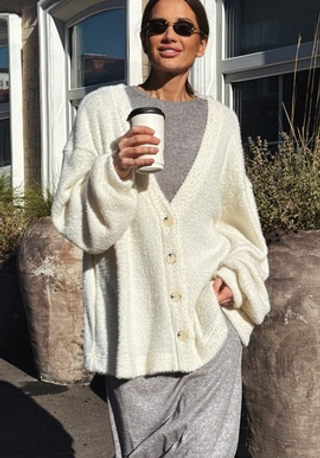 Жакеты и жилетки