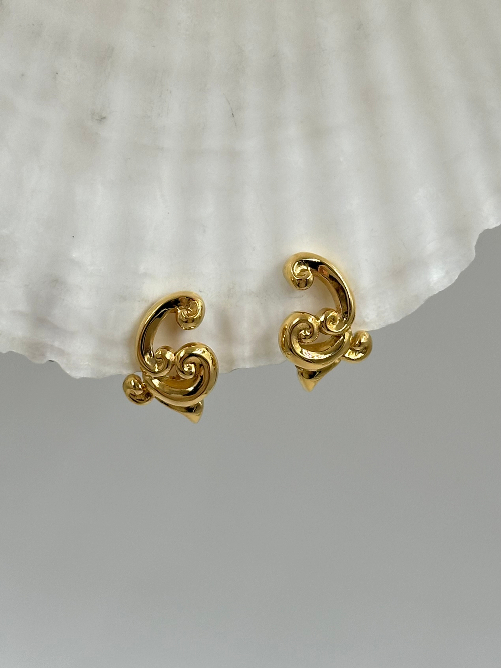 Клипсы Завитки Nina Ricci