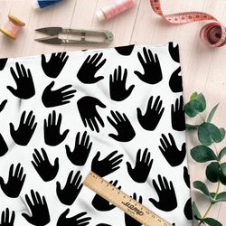 Ткань атлас чёрные ладони на белом фоне