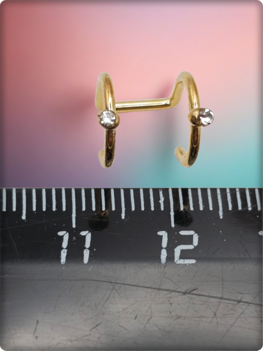 Клипса без прокола ушей "Двойная с кристаллом" золотистая.