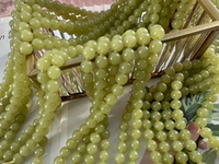 Нить бусин из тонированного кварца 8мм, гладкие