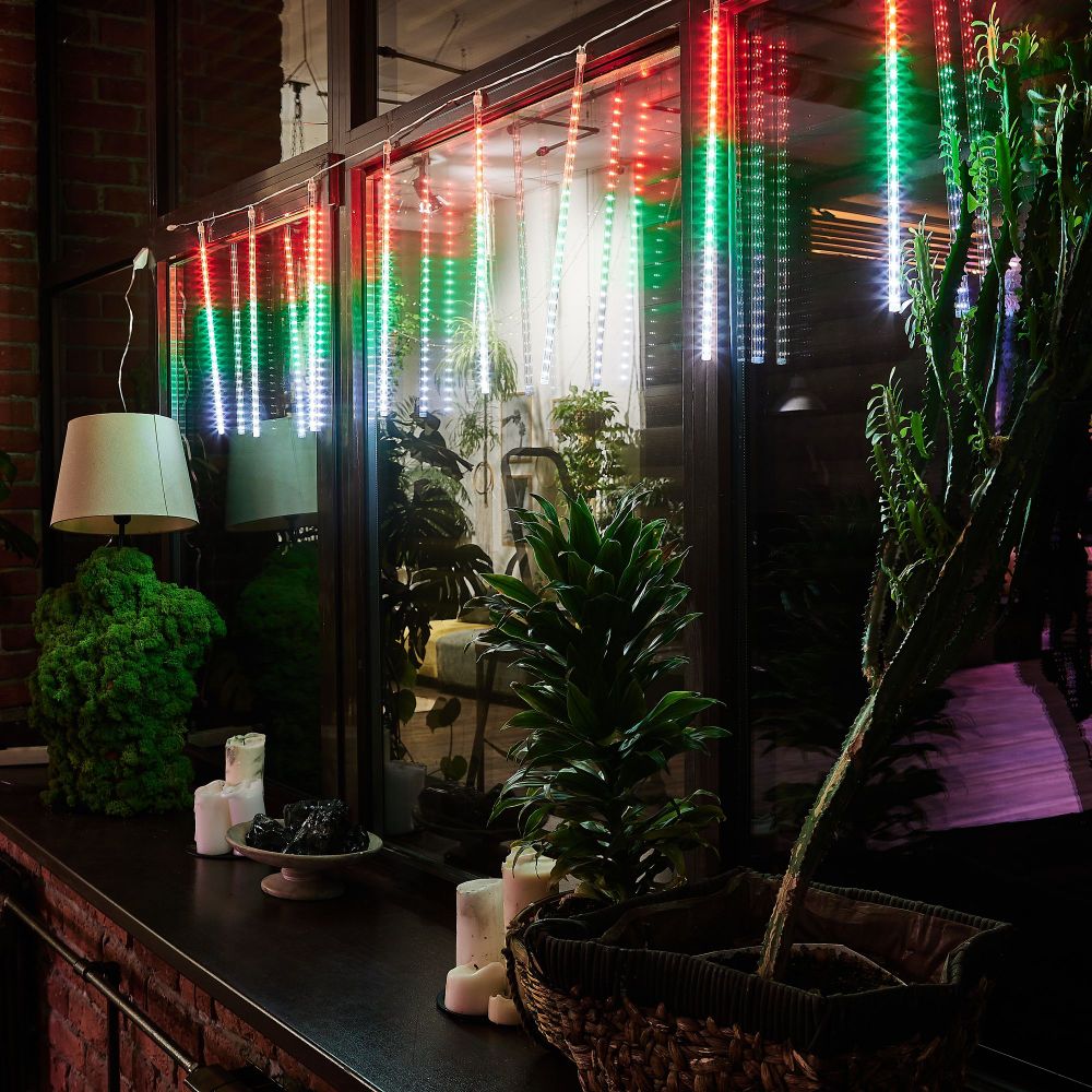 ULD-E2405-240-DTK MULTI IP44 METEOR Занавес светодиодный фигурный Падающие звезды. соединяемый. 2х0.5м. 8 подвесов. Разноцветный свет. Провод прозрачный. TM Uniel.