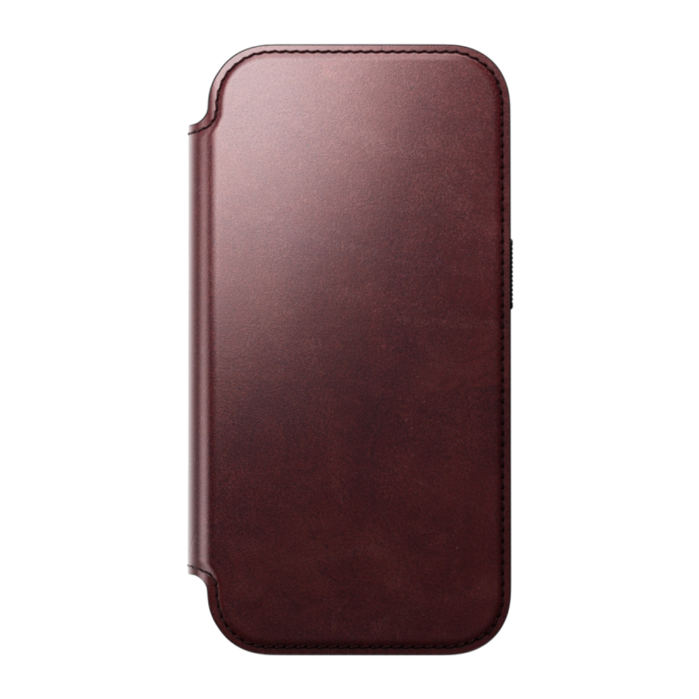Кожаный чехол-книжка MagSafe Nomad Horween Modern Leather Folio Limited Edition для iPhone 17 Pro Гибридный укреплённый чехол из натуральной кожи Horween с сенсорной накладкой для Контроллера камеры. Есть отделение для купюр и встроенный картхолдер — вмещ