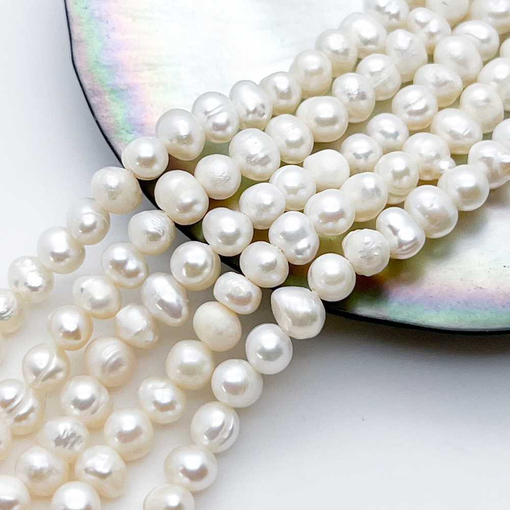 Жемчуг, размер около 5,8*4,8 мм, цена за 36-37 шт (1/2 нити)