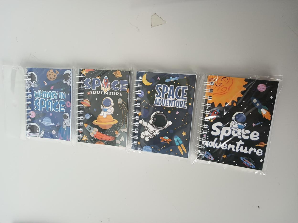 Блокнот "Космос" 10,5*7,5см на спирали. 4 шт в наборе