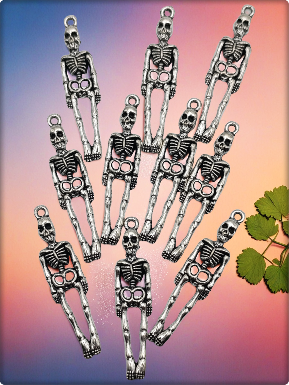 Подвески для рукоделия "Скелеты" серебристые.