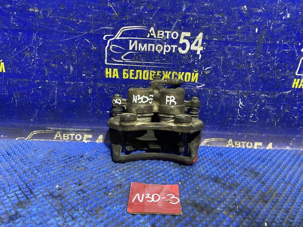 Суппорт тормозной передний правый NISSAN R'NESSA 2000