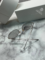 Солнечные очки Prada