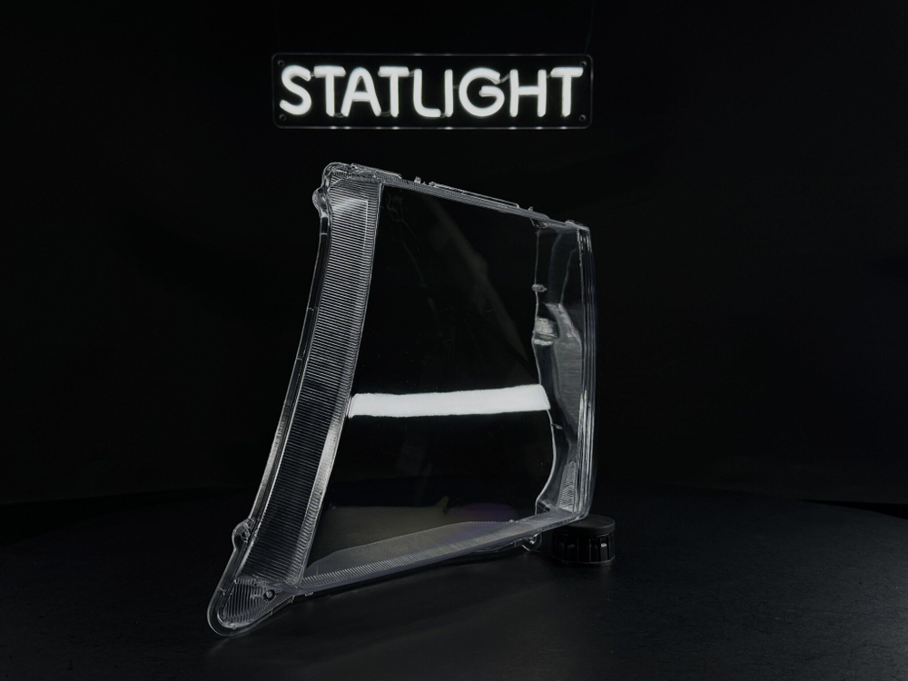 Левое стекло фары Nissan Navara Pathfinder R51 2004-2010