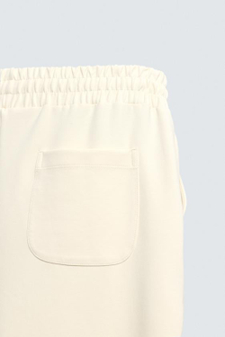 ZARA ДЖОГГЕРЫ ИЗ ВЫСОКОТЕХНОЛОГИЧНОЙ ТКАНИ С ДЕКОРАТИВНЫМИ ШВАМИ, ЭКРЮ