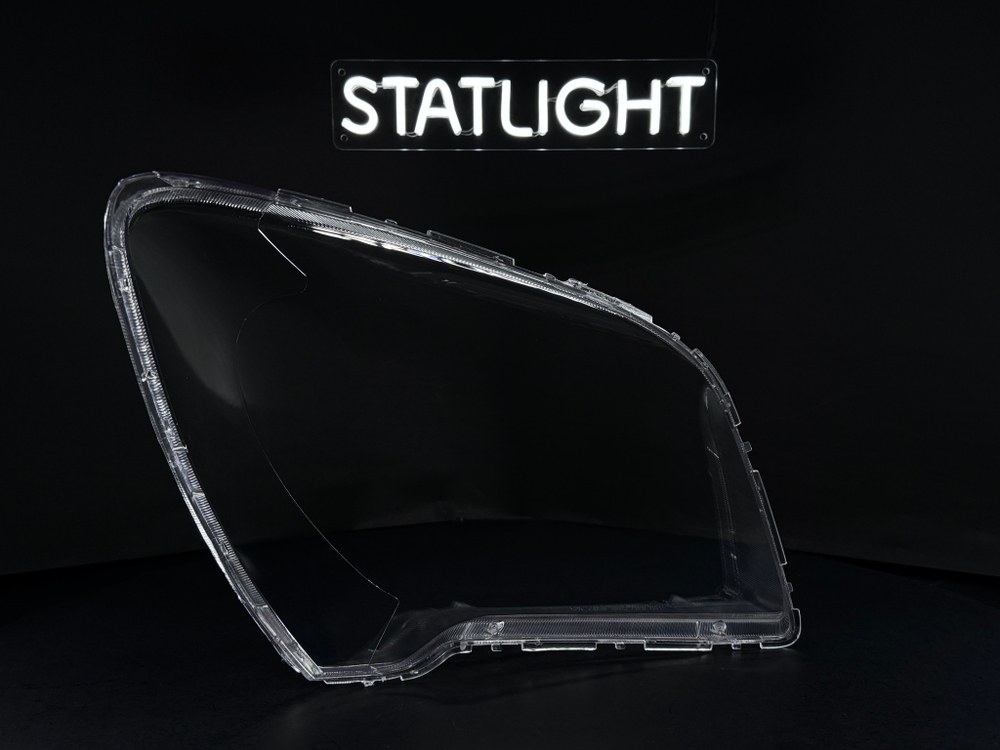 Левое стекло фары KIA Sportage 2 2008-2010 рест