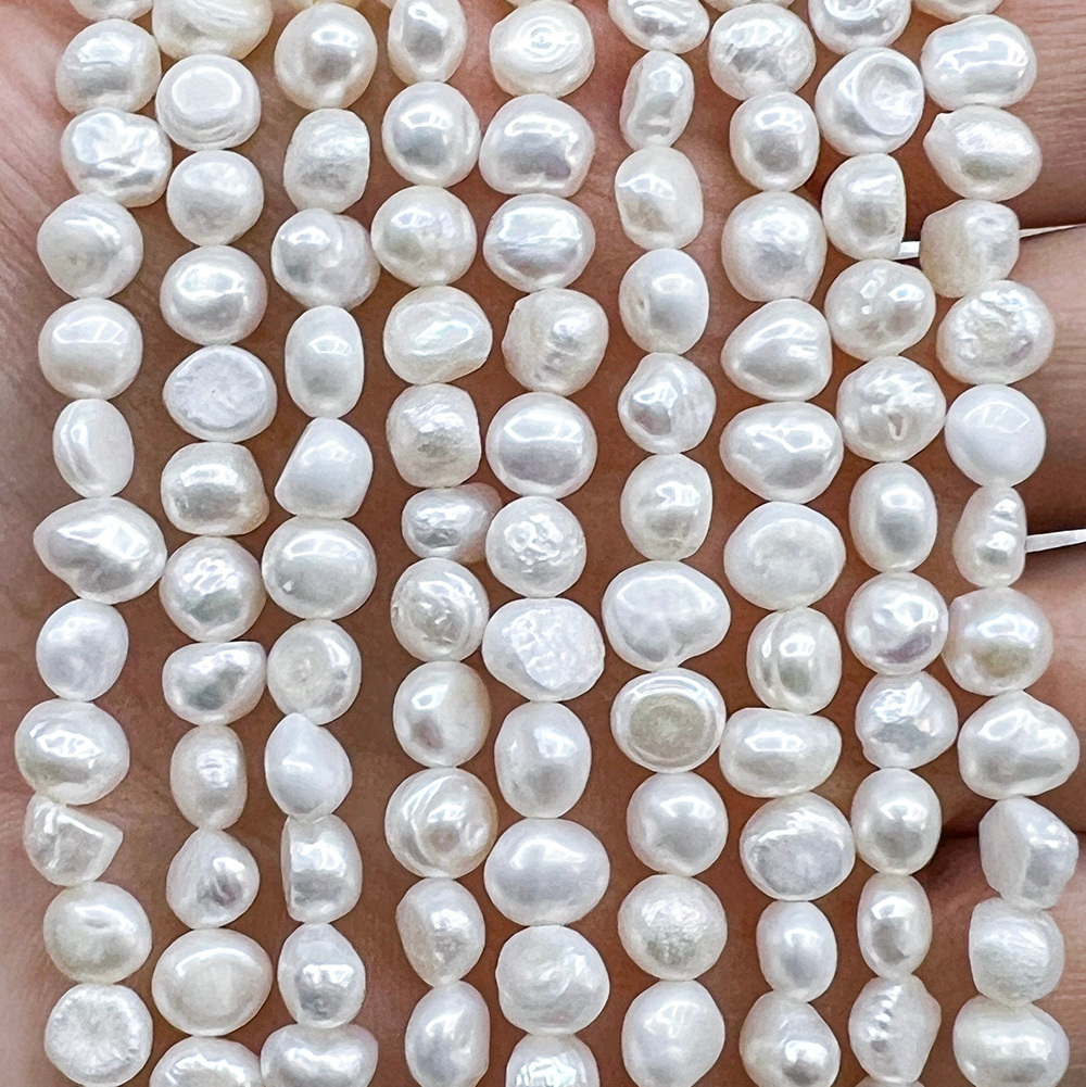 Жемчуг 2А речной бусины 6 мм, на нитке 38 см