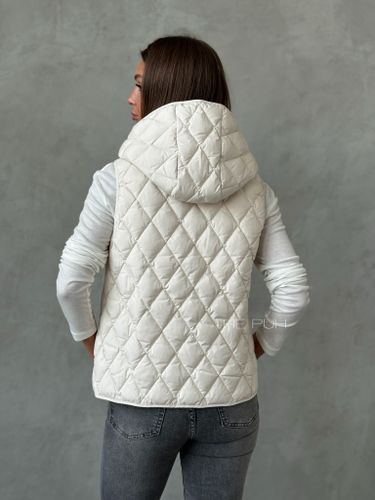 Бежевое шерстяное пальто с утепленным жилетом