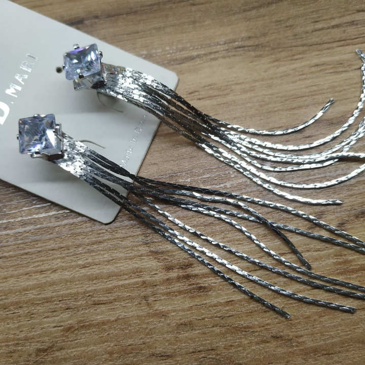 Серьги англ.заст. Bogema кристалл ромбик цепочки жгутики металл серебристый