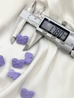 Пуговицы бантики фиолетовые пластиковые